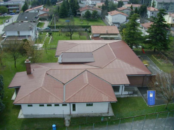 Coil coatings for building roof panels