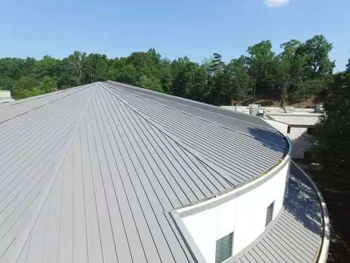 Coil coatings for building roof panels