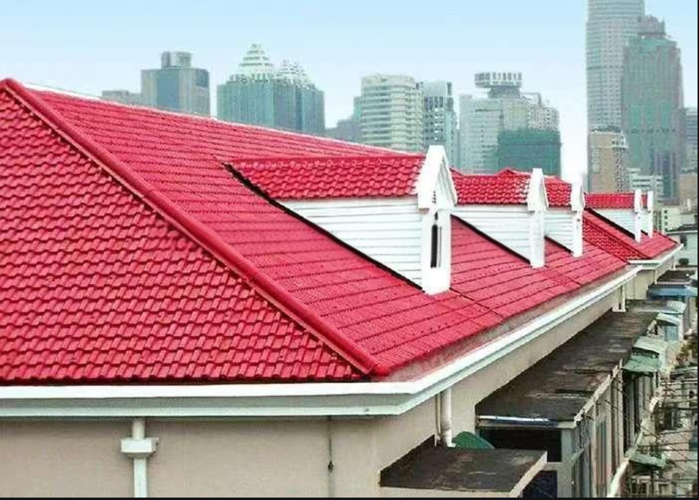 Coil coatings for building roof panels